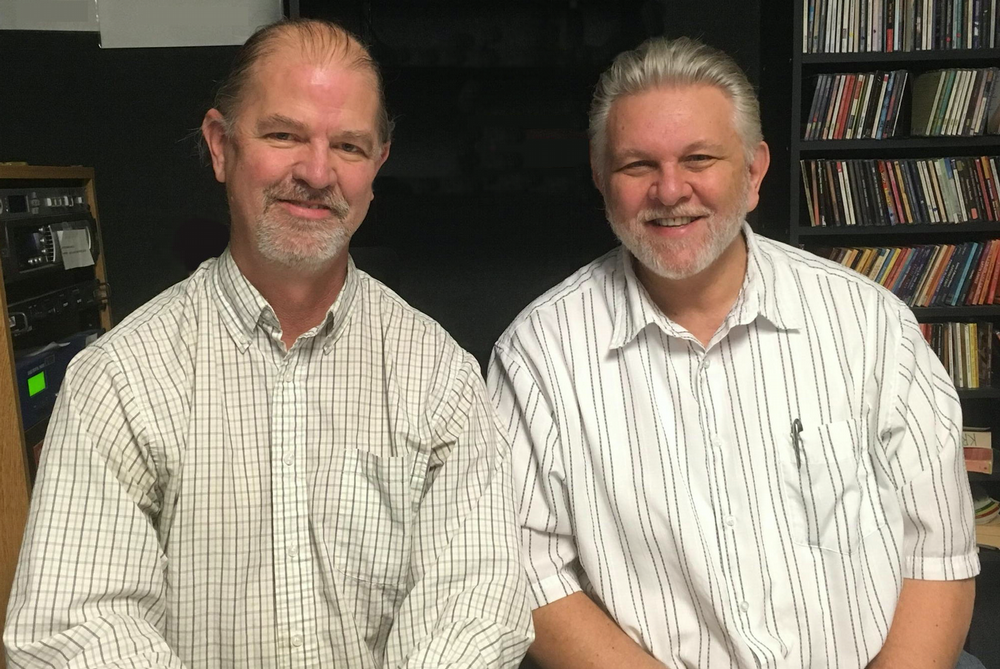 Two men(Dr. Fred Bugbee and Dr. Lon Chaffin)  sitting next to each other